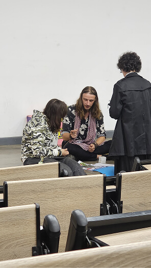 BUE students reviewing Melbrins' sketchbooks